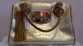 Bolsa Charming Charlie Dourada